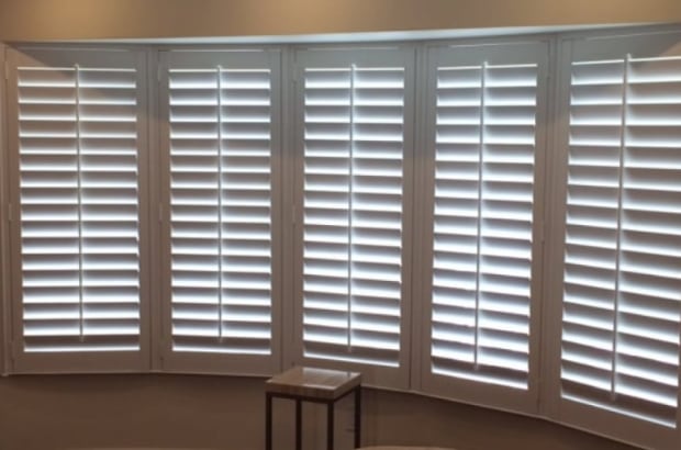 Plantation shutters on a bow window